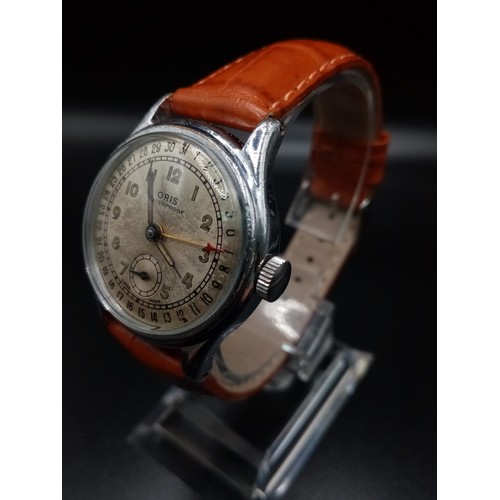 462 - A Vintage Rare Oris Mechanical Calendar Watch. Leather strap. Case - 32mm. Sub second dial. In worki... 