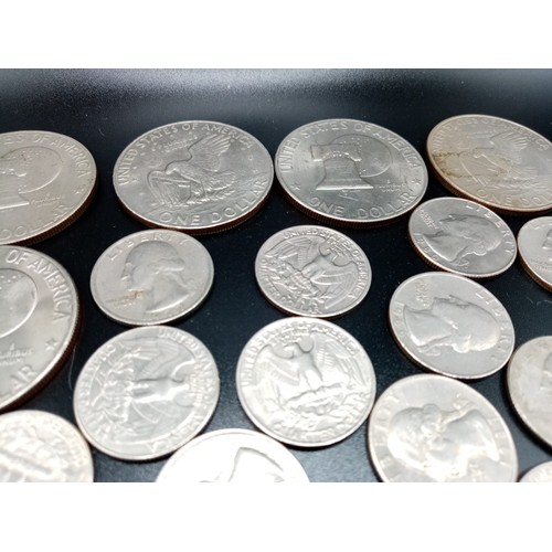 542 - A collection of 50 American Dollars, Half Dollars and Quarter Dollars all dating from the 1960’s to ... 