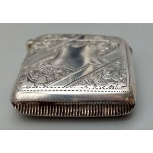 8 - An Antique Silver Engraved Vesta Case with Vacant Cartouche. Hallmarks for Birmingham 1897. Makers m... 
