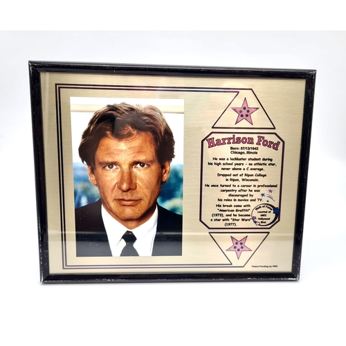 449 - A Harrison Ford Picture (1990s) and Informative Plaque. In frame - 25 x 21cm.