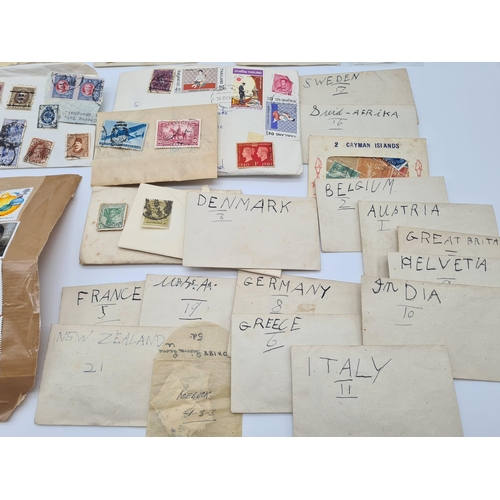 975 - A Pot Luck Vintage and Antique Stamp Collection. Please see photos. A/F