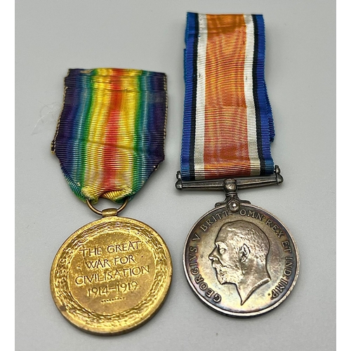 488 - Two WW1 Service Medals with Ribbons. The victory medal and the George V silver service medal.