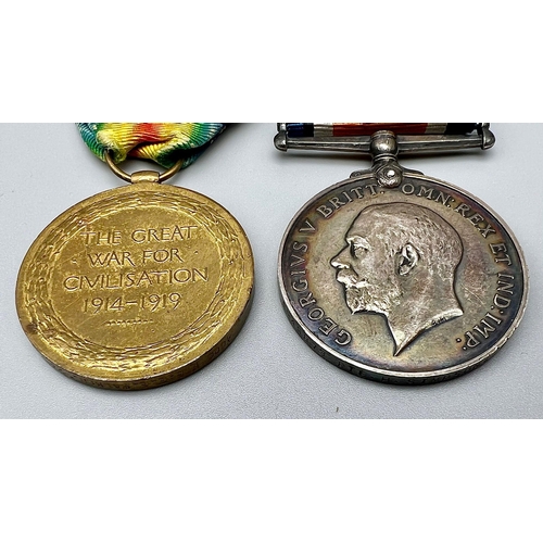 488 - Two WW1 Service Medals with Ribbons. The victory medal and the George V silver service medal.