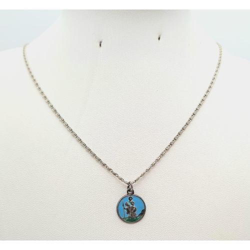 889 - A Silver Necklace with Enamel St. Christopher Pendant.
1 and 44cm. Plus a silver ingot pendant - 4.5... 