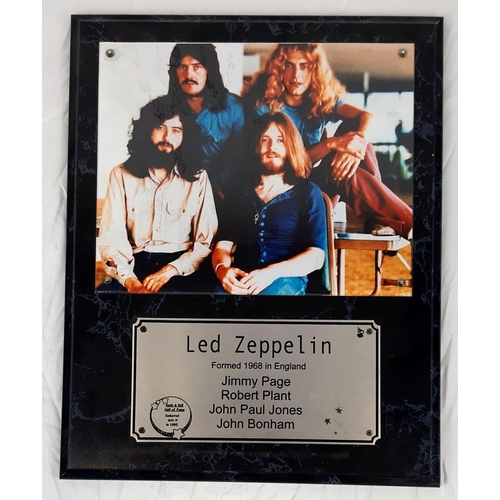 448 - A Led Zeppelin Group Picture (Circa late 70s) with Informative Plaque. On wooden base - 32 x 39cm.