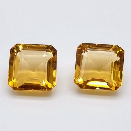 197 - A good pair of square cut citrines (10.97 & 11.32 carats). Both flawless, with strong colouration an... 