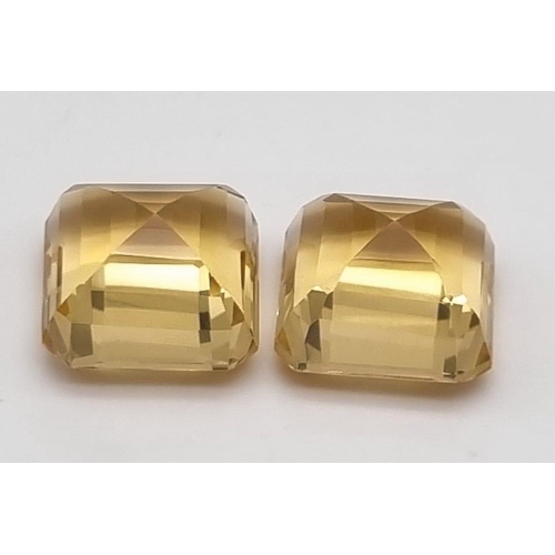 197 - A good pair of square cut citrines (10.97 & 11.32 carats). Both flawless, with strong colouration an... 