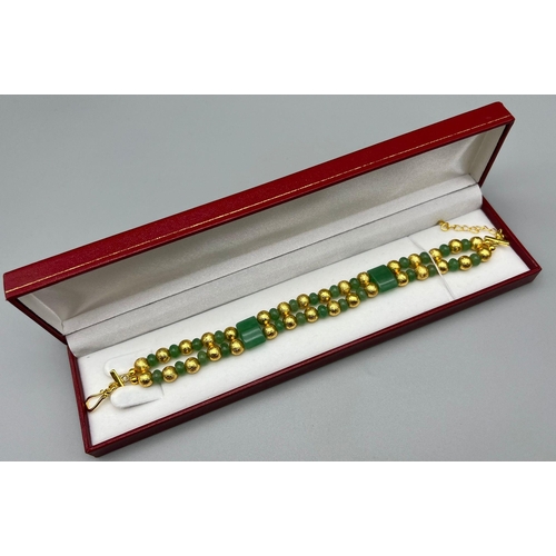 225 - A very feminine, pale green jade, bracelet in a presentation box, Length: 22 cm, weight: 38 g.