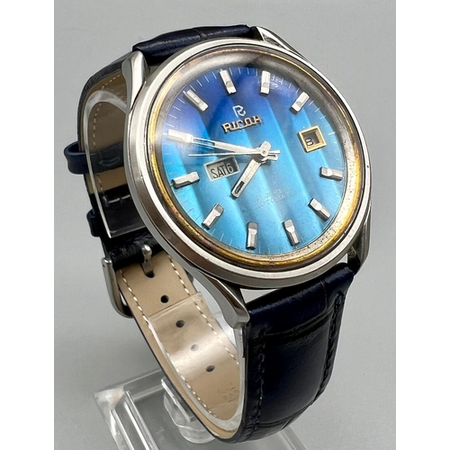 422 - A Vintage Ricoh Automatic Gents Watch. Blue leather strap. Stainless steel case - 38mm.Blue dial wit... 