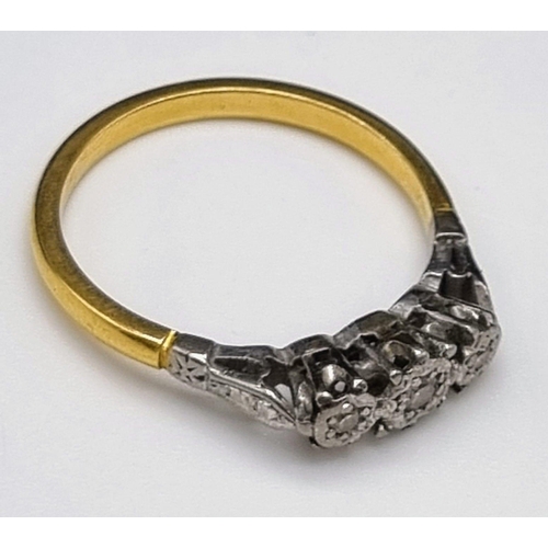 61 - A 9K yellow Gold Diamond Trilogy Ring. Size O. 2.68g