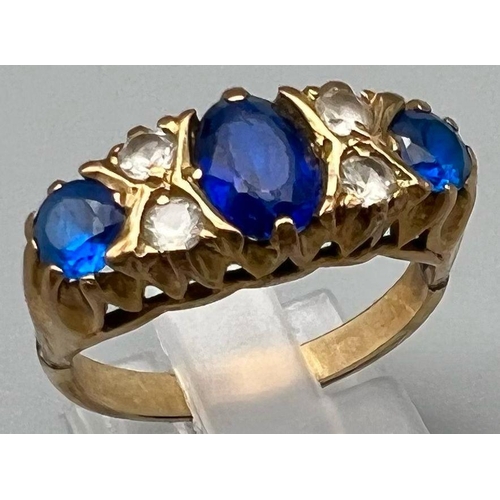 97 - A 9K Yellow Gold Blue and White Stone Ring. Size O.
4.1g total weight.