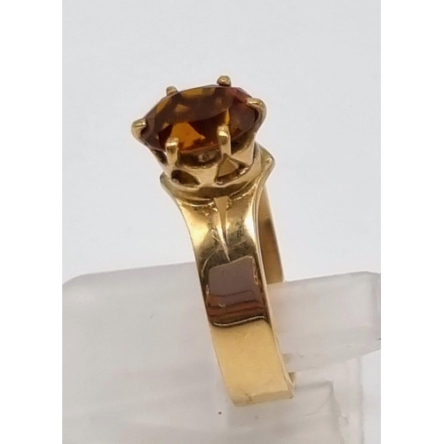 10 - A Vintage 9K Yellow Gold Citrine Ring. Solitary citrine oval cut gemstone (1ct). Size L. 3.49g total... 