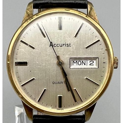 298 - A Vintage Accurist Gents Quartz Watch. Case -35mm. Day/date window. In working order.