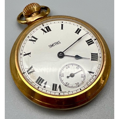 317 - A Smiths Gilded Metal Pocket Watch. Top winder with sub second dial. 5cm diameter case. In working o... 