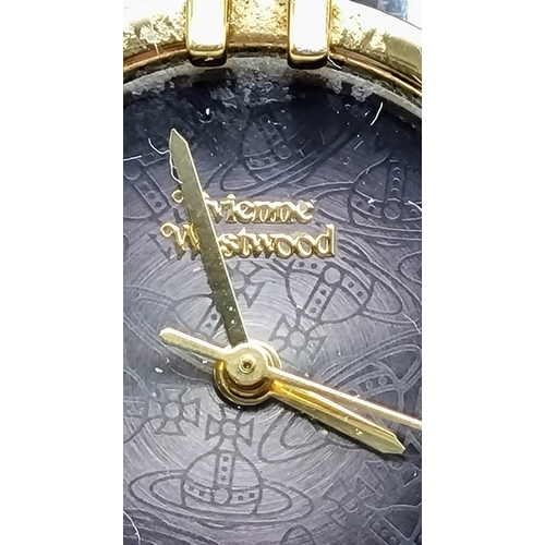 498 - A Vivienne Westwood Ladies Quartz Dress Watch. Leather strap. Gilded orbiting case - 35mm. In workin... 