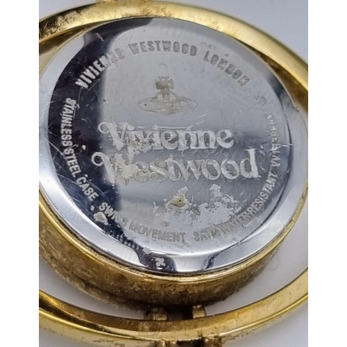 498 - A Vivienne Westwood Ladies Quartz Dress Watch. Leather strap. Gilded orbiting case - 35mm. In workin... 