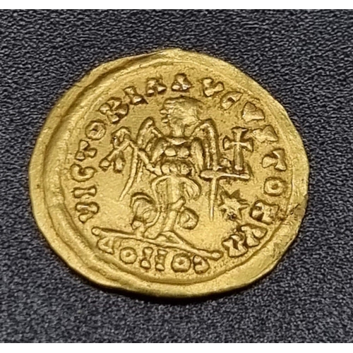 2 - An Ancient Theodoric Gold Tremissis, Rome-Mint Coin. 491 - 518. 1.41g. Obverse: Bust of Anastasios f... 