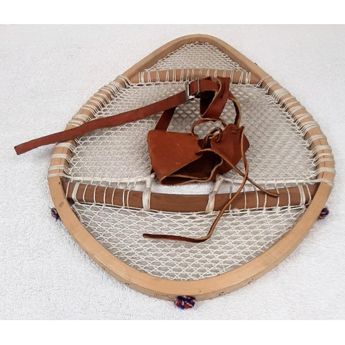 393 - A Pair of Vintage Hand-Crafted Innuit Snowshoes from Newfoundland and Labrador. 58 x 40cm.