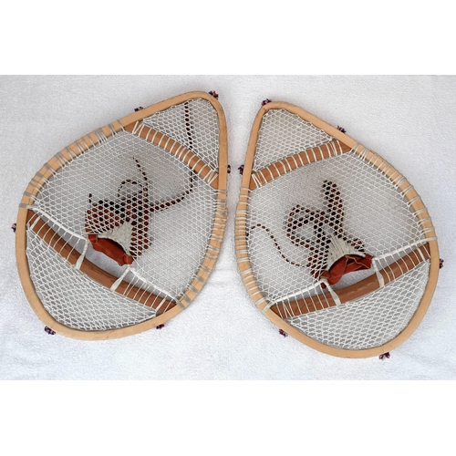 393 - A Pair of Vintage Hand-Crafted Innuit Snowshoes from Newfoundland and Labrador. 58 x 40cm.