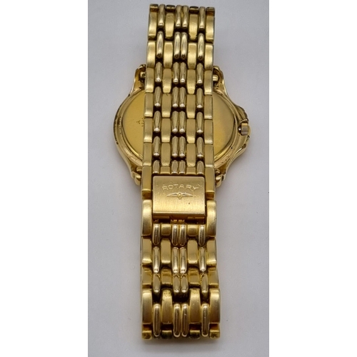 264 - A Rotary Gold Plated Gents Quartz Watch. Case - 35mm.
Champagne dial with date window. In working or... 