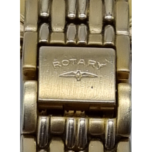 264 - A Rotary Gold Plated Gents Quartz Watch. Case - 35mm.
Champagne dial with date window. In working or... 