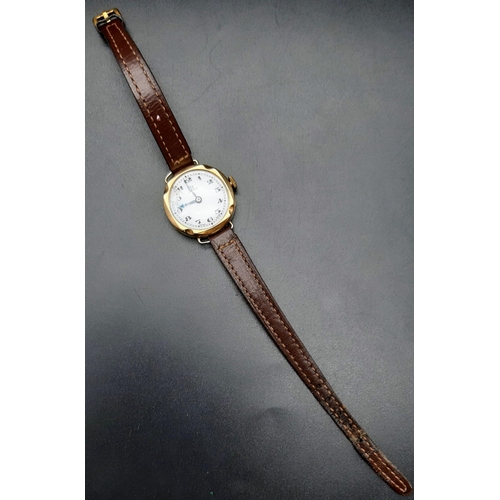 3 - A Vintage Omega 9K Gold Cased Ladies Watch. Leather strap. Gold case - 26mm. Mechanical movement but... 