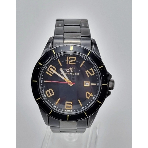 366 - A Klaus Kobec Quartz Gents Watch. Black steel strap and case - 45mm. Black dial with date window. In... 