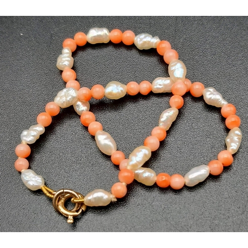 537 - A Coral and Seed Pearl Necklace and Bracelet. 40 and 18cm.