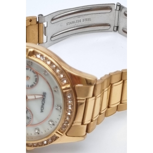 540 - A Sekonda Rose-Gold Plated Ladies Quartz Watch. Case - 35mm. White dial with three sub dials. White ... 