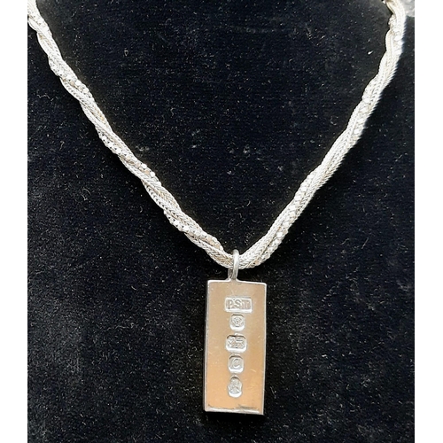 654 - A 1977 Sterling Silver Jubilee Ingot on a Sterling Silver Twisted Rope Necklace. Hallmarks for Sheff... 