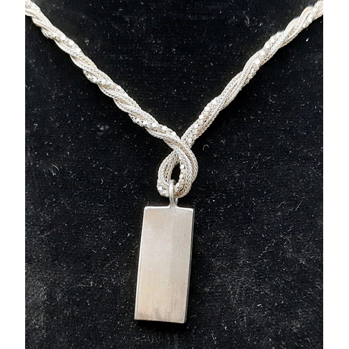 654 - A 1977 Sterling Silver Jubilee Ingot on a Sterling Silver Twisted Rope Necklace. Hallmarks for Sheff... 