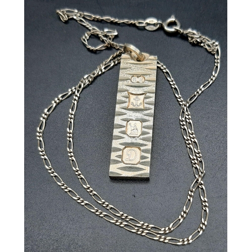 680 - A Sterling Silver Ingot Pendant - On a sterling silver necklace. Hallmarks for Birmingham 1978. 4 an... 