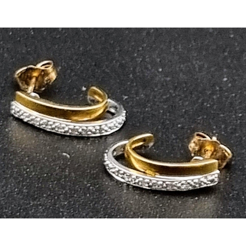 13 - A Pair of 9K Yellow and White Gold Diamond Crescent Earrings. 16mm. 2.1g total weight.