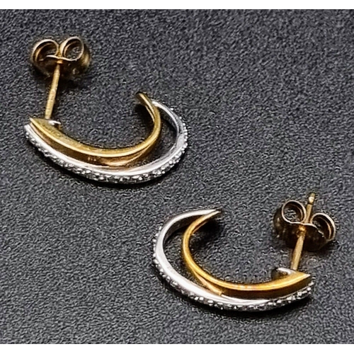 13 - A Pair of 9K Yellow and White Gold Diamond Crescent Earrings. 16mm. 2.1g total weight.
