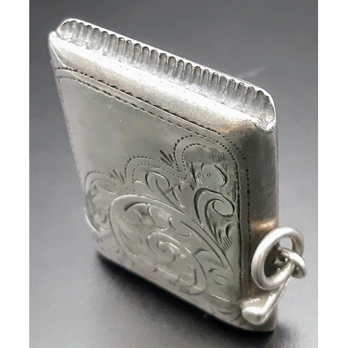 506 - An Antique Silver Engraved Vesta Case. 4 x 5cm. 
Hallmarks for Birmingham 1918. Makers mark of Josep... 