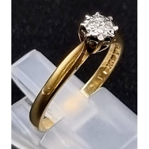 71 - A 9K Yellow Gold Diamond Ring. Four small diamonds.
Size O. 2.16g total weight.