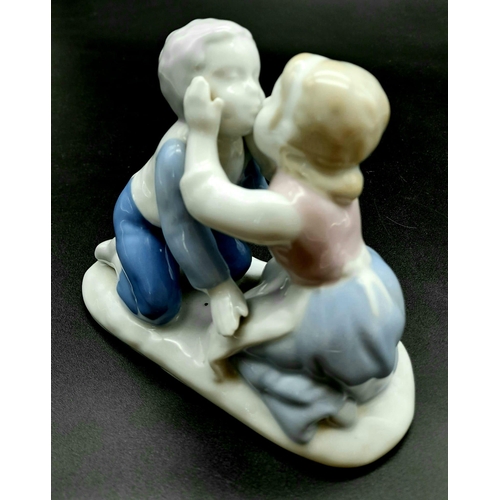 1036 - A sweet vintage ceramic figurine by Gerold Porcelain, stamped for West Germany depicting two young l... 