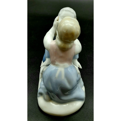 1036 - A sweet vintage ceramic figurine by Gerold Porcelain, stamped for West Germany depicting two young l... 