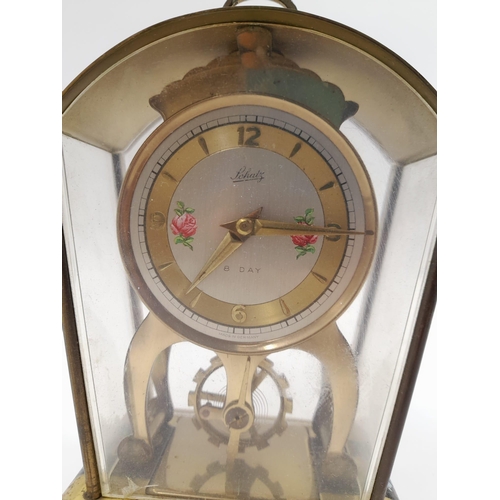 1050 - Schatz Sohne #59 German 8-Day Brass Skeleton Carriage Clock. With floral numeral dial, open escapeme... 