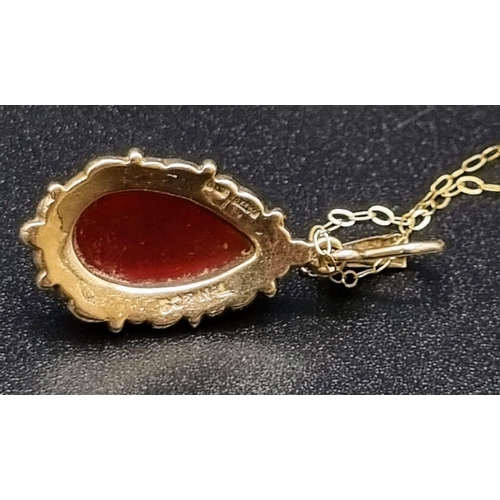 346 - A Vintage 9K Yellow Gold Carnelian Pendant on a 9K Yellow Gold Disappearing Necklace. 2 and 44cm. 3.... 