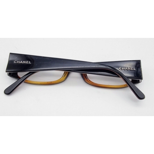 771 - CHANEL eye glasses in style 3102 - Black and brown - Neutral glasses - 50cm/16cm/135cm with original... 