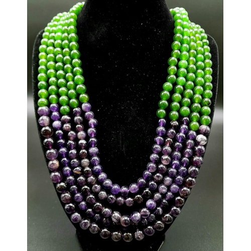 136 - A 1050ct Green and Purple Haze of Jade and Amethysts in a Five-Strand Necklace. 8mm beads. 46-50cm.