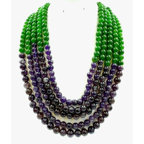 136 - A 1050ct Green and Purple Haze of Jade and Amethysts in a Five-Strand Necklace. 8mm beads. 46-50cm.