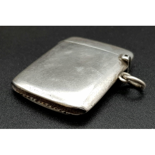 220 - An Antique Silver Vesta Case. Hallmarks for Birmingham 1909. Makers mark of Deakin and Francis. 3 x ... 