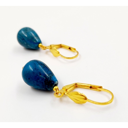 496 - A Pair of 18K Gold Plated Teardrop Blue Agate Earrings.
15mm teardrop.