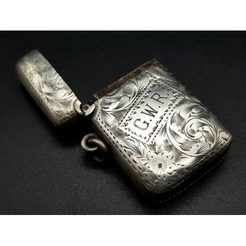 79 - An Antique Silver Vesta Case. Hallmarks for Birmingham 1899. Makers mark of T.H. Hazelwood. 3 x 4cm