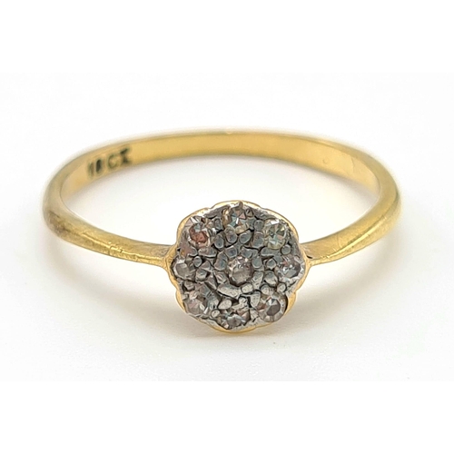 103 - An 18K Yellow Gold Floral-Shaped Diamond Ring. Size N.
1.7g.