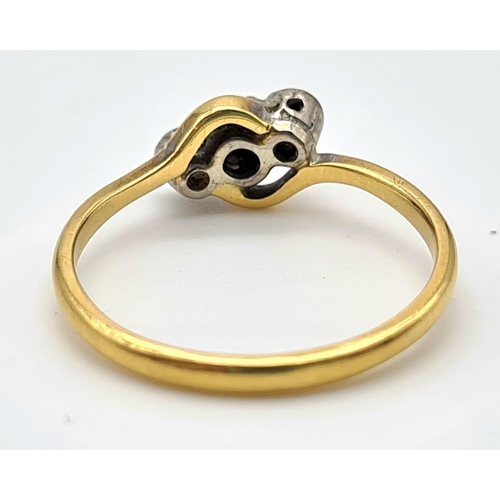 12 - An 18K Yellow Gold Three-Stone Diamond Ring. Size P.
2.7g