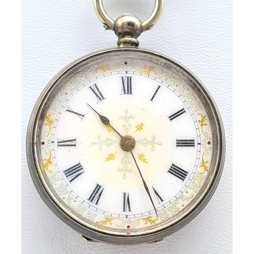 387 - A Silver (800) Antique Miniature Pocket watch with Fob and Key. A/F. 49.2g total weight.