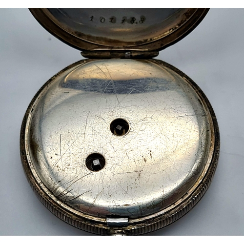 387 - A Silver (800) Antique Miniature Pocket watch with Fob and Key. A/F. 49.2g total weight.